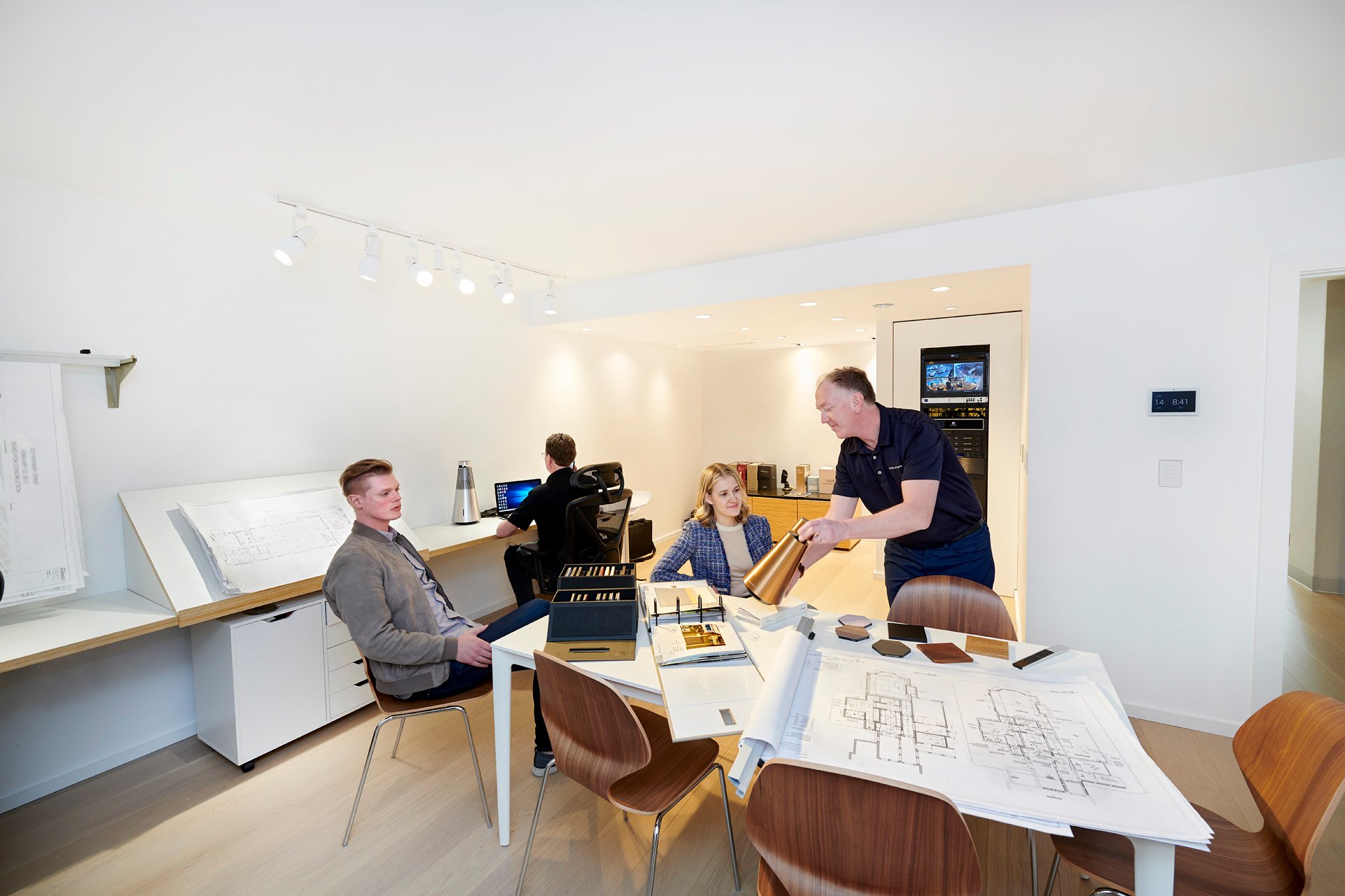 SoWa showroom: a speaker demonstration at the design consultation table